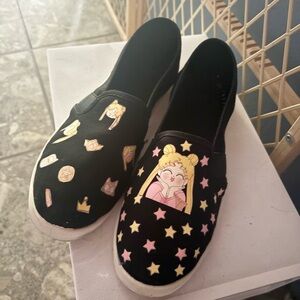 Black Slip-On Shoes with Cartoon Design